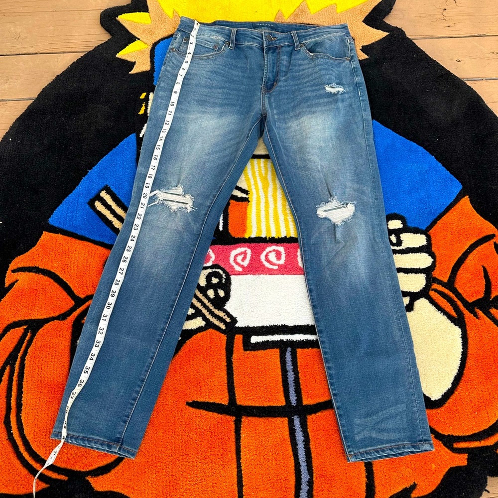 Dark blue rip jeans